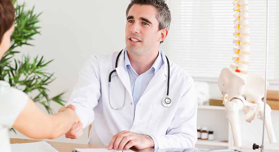 Doctor greeting a patient